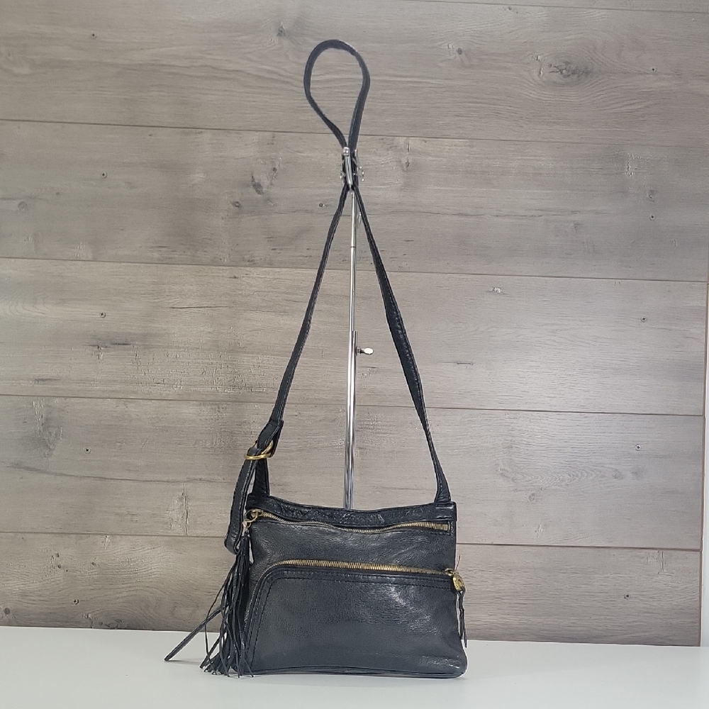 Hobo Black Leather Crossbody Bag in Black with Tassel Detail